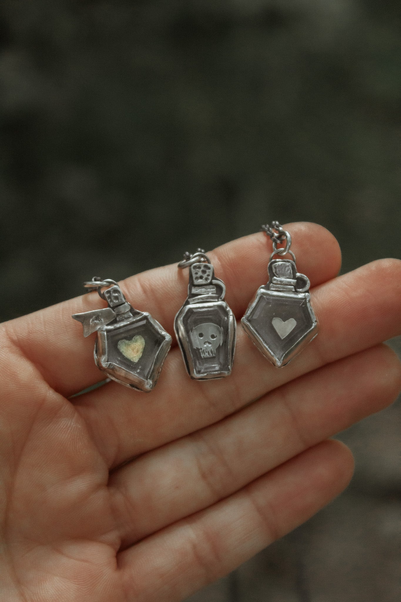 "Mischevious Potion Bottles" Necklaces
