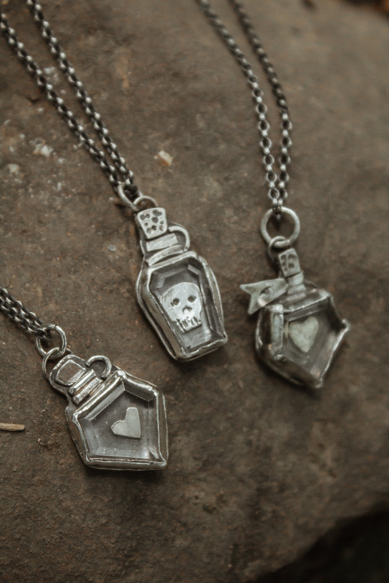 "Mischevious Potion Bottles" Necklaces